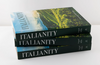 Three books titled 'Italianity' stacked on a white surface with a scenic cover.