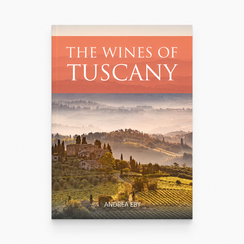 A book titled 'The Wines of Tuscany' by Andrea Eby, featuring a terracotta-colored top banner with white text and a scenic photograph of a Tuscan vineyard landscape below.