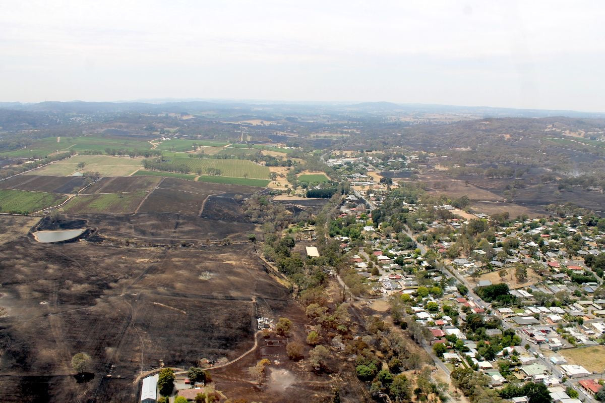 An aerial shot of Woodside in the Adelaide Hills is clearly showing the fire damage